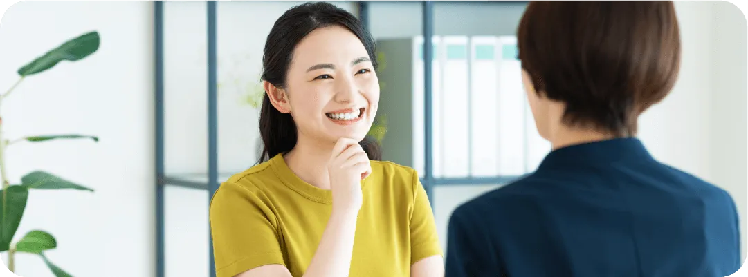 FPに相談する笑顔の女性
